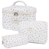 Honitty floral quilted makeup bag front view for easy travel organization.
