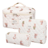 Honitty makeup bag with floral quilted front view for daily cosmetics organization.
