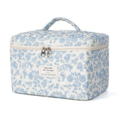 Honitty makeup bag with quilted floral pattern for organized cosmetics on the go