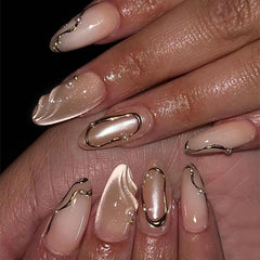 HOSAILY 3D gold press-on nails in nude cat-eye set showing gradient shimmer for everyday style