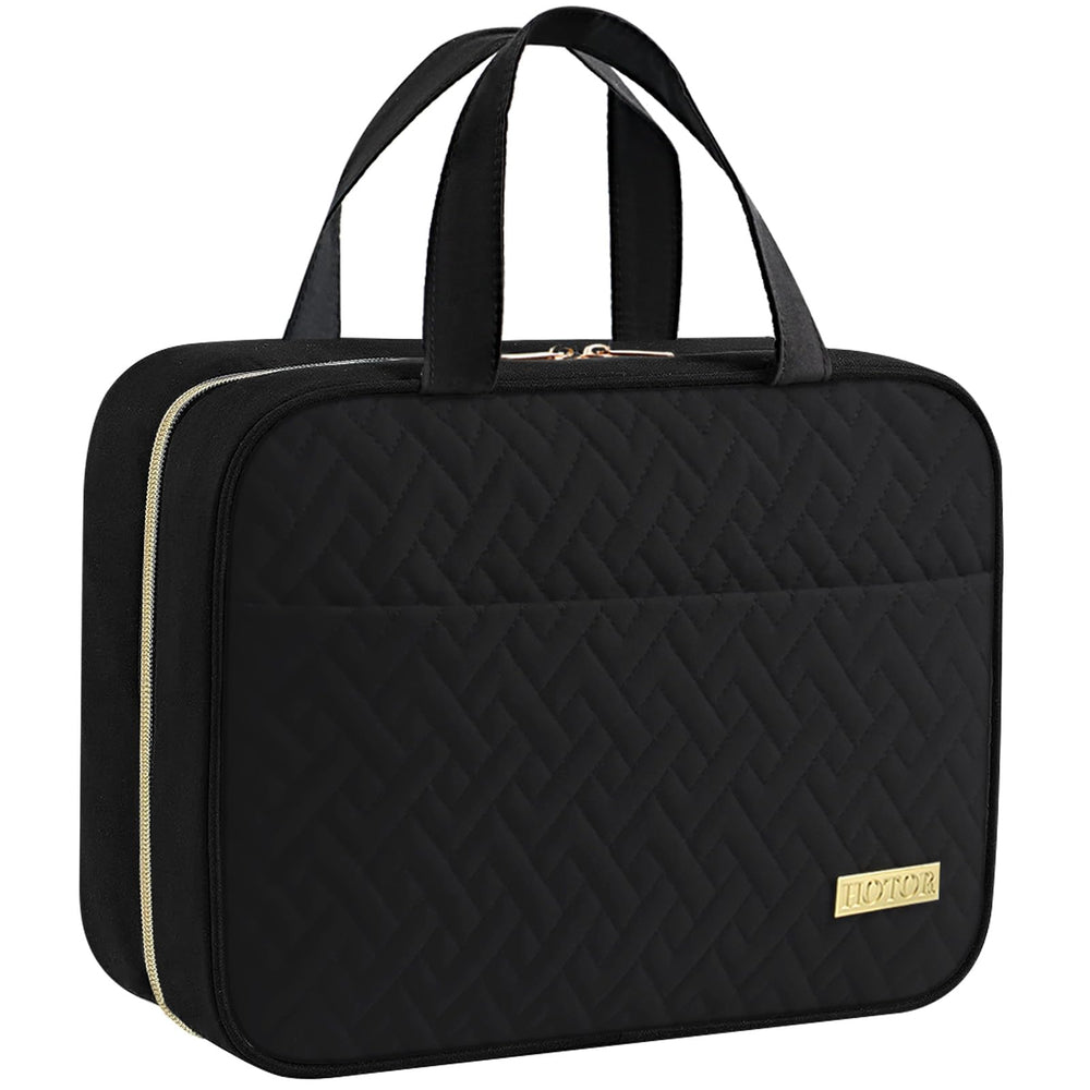 HOTOR travel toiletry bag hanging on hook with organized compartments for travel essentials.