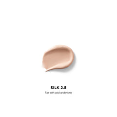 Hourglass Vanish Airbrush Concealer precision applicator closeup for precise coverage and blending.