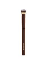 Hourglass Vanish Concealer Brush close-up showing precise, seamless blending for a flawless finish.