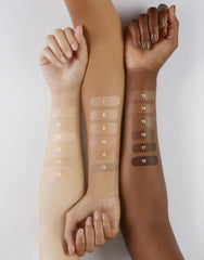 Hourglass Veil Hydrating Skin Tint on skin in daylight with glow