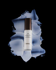 Hourglass Veil Mineral Primer long wear makeup close-up shows foundation gliding on and lasting.