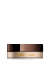 Hourglass Veil Translucent Setting Powder jar with sifter for seamless, pore-blurring finish.
