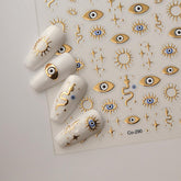 HPYFOI Gold Evil Eye Nail Sticker package showcases 5D embossed design for chic nails.