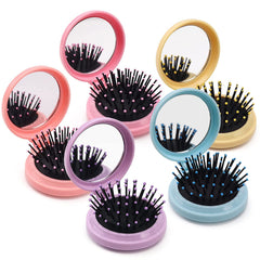 HQSLsund round pocket hair brush with soft bristles for detangling.