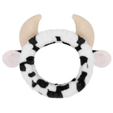 Huachi cow headband for washing face with plush fabric keeps hair tidy during cleansing.