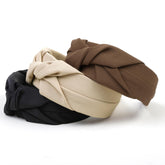 Huachi knotted headbands in black closeup showing secure, stylish twist for daily wear.