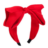 Huachi red bow headband front view for festive holiday styling.
