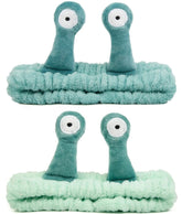 Huachi snail spa headband washing face with cute wiggle tentacles for mess-free skincare.