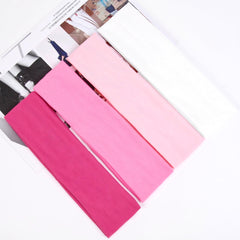 Huachi white and pink headbands in color-packed group photo