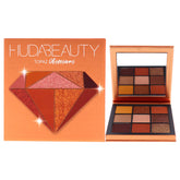 Huda Obsessions Topaz palette close-up swatches show rich pigment for day-to-night looks.