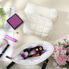 Huhumy puffy makeup bag set side stitching detail highlights durable construction for daily use.
