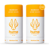 HUME SUPERNATURAL Amber Woods deodorant stick close-up showing aluminum-free formula for fresh underarms.