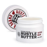 Hustle Butter Deluxe tattoo balm application shows smooth, soothing lubrication for healing tattoos.