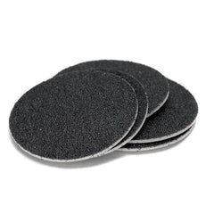 I·B·N G adhesive backing close up on disc