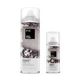 IGK FIRST CLASS Charcoal Detox Dry Shampoo bottle close-up boosts oil absorption for refreshed hair