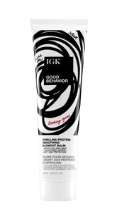 IGK Good Behavior Spirulina Balm bottle emphasizes keratin-like smoothing for blowouts.