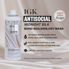 IGK Good Behavior Spirulina Spray mist applied to hair for a sleek finish.