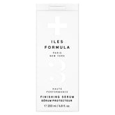 ILES FORMULA Weightless Styling Cream bottle on vanity showing heat protection for sleek blowouts.