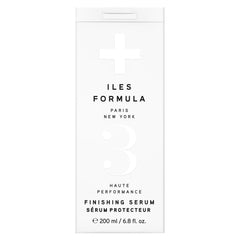 ILES FORMULA Weightless Styling Cream bottle on vanity showing heat protection for sleek blowouts.