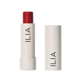 ILIA Balmy Tint Hydrating Lip Balm Heartbeats swatch provides warm red color with nourished lips