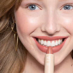 ILIA Color Block Lipstick full-coverage application showcases vibrant French nude tone.