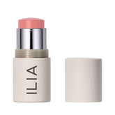 ILIA Multi-Stick The Mood swatch on skin for warm peach glow.