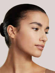 ILIA True Skin foundation application image illustrating smooth blending.