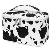 IMCUZUR cow print travel makeup bag front view for compact, organized travel essentials.