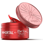 Immortal NYC Strawberry Hair Wax bottle closeup showing glossy hold for all hair types.