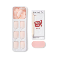 imPRESS KISS Color Press-On Kit contents with prep pad, mini file, and stick for easy application.