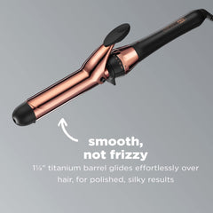 Conair INFINITIPRO rose gold curling iron in action creating loose curls.