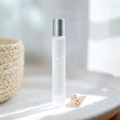 Inis the Energy of the Sea roll-on packaging with frosted bottle evokes beach pebble elegance, travel-ready