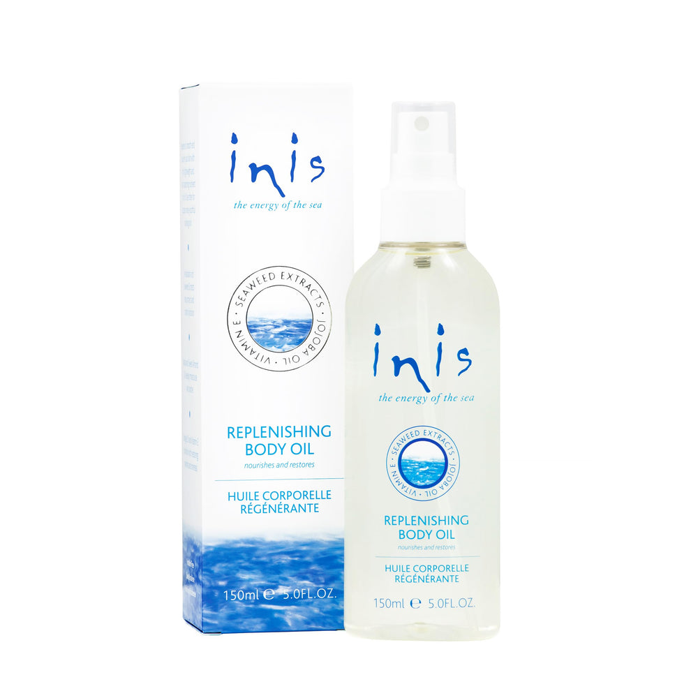 Inis replenishing body oil bottle showing lightweight spray for dry skin.