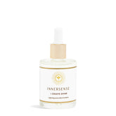 INNERSENSE Glossing Serum bottle delivers radiant shine with a lightweight finish