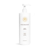 INNERSENSE Natural Clarity Hairbath bottle demonstrates fragrance-free cleansing for sensitive scalps.