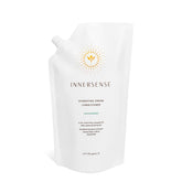 INNERSENSE Natural Hydrating Cream Conditioner bottle close-up for deep moisture and frizz control.