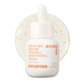 innisfree Green Tea Enzyme Serum bottle pour for radiant skin
