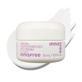 Innisfree Orchid Eye Cream jar closeup, showing a rich, brightening cream texture.