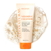 InstaNatural Vitamin C Cleanser bottle pour showcasing refreshing lather for brightening