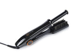 InStyler MAX rotating-barrel-straightener in action delivering sleek frizz control