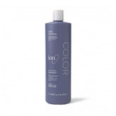 ion Color Defense Shampoo bottle close-up showing vegan, color-treated hair care.