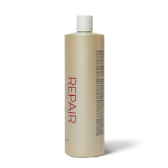 Ion Effective Care Treatment 338oz application on hair — helps repair and rehydrate strands.