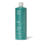 Ion Thickening Shampoo bottle pouring, promoting gentle cleansing and added volume