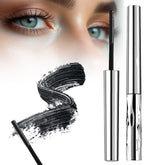 Iron Wand Mascara metal wand close-up showing defined curls and lash separation.