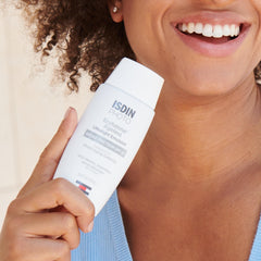 ISDIN tinted sunscreen swatch showing natural finish and even skin tone.