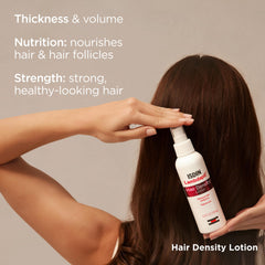 ISDIN Lambdapil bottle pour demonstrates lightweight non-greasy texture.